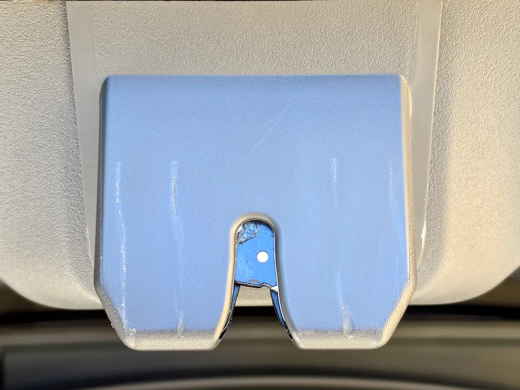 Gravity liftgate latch cover.webp